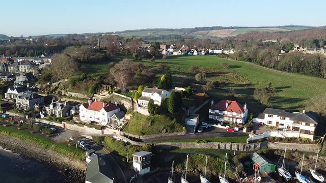 Aberdour village and Boat Club aerial view. Black Sands beach, Fife, Scotland