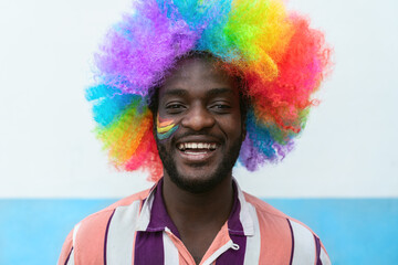 Happy African man having fun during gay pride festival day