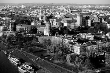 Aerial view of Royal Wawel castle with park and Vistula river in Krakow, Poland. Black and white photo.