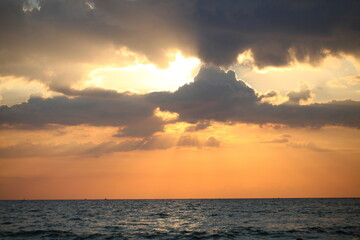 evening sky over the ocean overcast with thunderclouds sunset