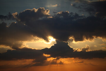 evening sky over the ocean overcast with thunderclouds sunset
