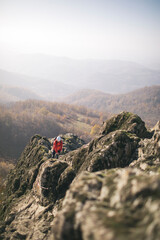 Fully equipped man climbing along a via ferrata