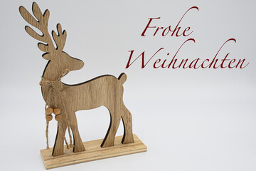 Wooden reindeer on a white background