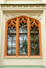 Beautiful carved window. Architectural masterpieces. Ancient building.
