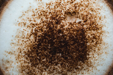 closeup coffee cup on wood table bar in restaurant or cafe with copy space. fresh beverage.