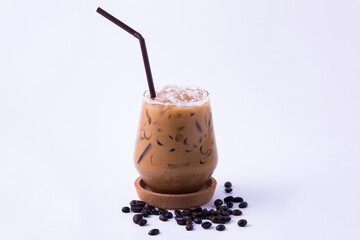 Coffee and coffee beans on white table.
