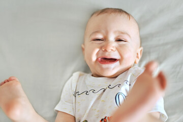 Happy toddler baby smiling - 396093903