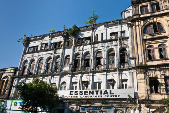 Yangon, Myanmar - January 2, 2012: Colonial architecture of the historical center in Yangon