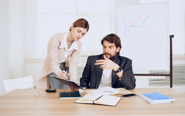 colleagues at work desk office officials team