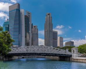 A view from a river boat on the Singapore River past the Anderson Bridge in Singapore, Asia