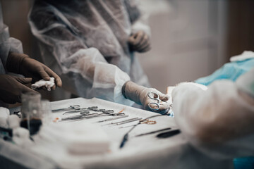 table with surgical instruments, the work of an assistant in a surgical operation