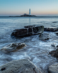 Fototapeta na wymiar Grey morning at St Marys Lighthouse, Whitley Bay, on the north east coast of England, UK.