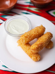 cheese sticks - fried breaded cheese served with creamy sauce. Asian style