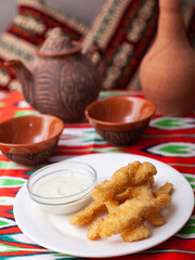 chicken nuggets - and breaded fried chicken served with a creamy sauce. Asian style