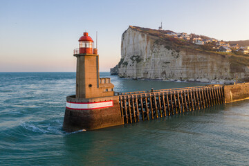 Vue aérienne (drone) du phare rouge de Fécamp au lever du soleil, en Normandie, en France © Benoît