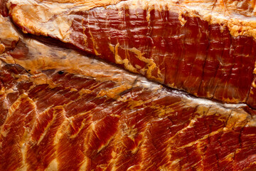 Stripy cured pork side bacon pancetta smoked on wood chip