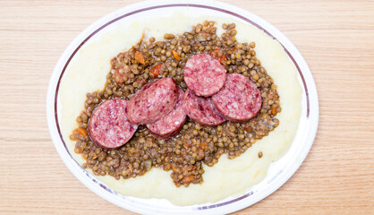 Italian pork sausage served with lentils