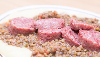 Italian pork sausage served with lentils