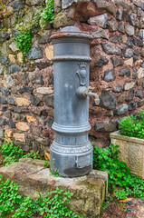 Fototapeta na wymiar Traditional free water public fountain in Rome, Italy