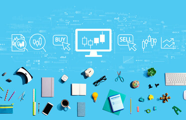 Stock trading theme with collection of electronic gadgets and office supplies