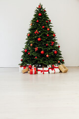 Christmas interior of the home Christmas tree presents the new year as a backdrop