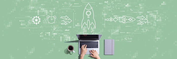 Rapid growth concept with person working with a laptop