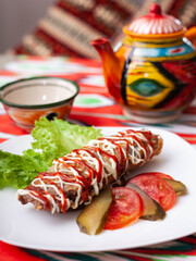  Brizol - a dish of omelet and beef covered with ketchup and mayonnaise in an oriental style