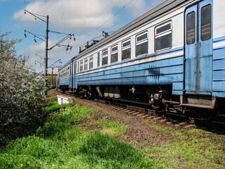 Obraz premium Electric train cars moving to the station