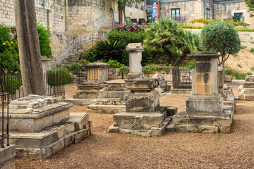 Fototapeta na wymiar Graves at the Msida Bastion Historic Garden, Formerly known as the Msida Bastion Cemetery, Floriana, Malta.