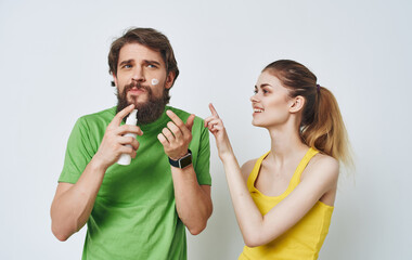 cheerful young couple t-shirts communication skin care