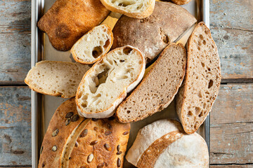 bread assortment of pastrie many different kinds of bake healthy meal  top view copy space for text food background rustic