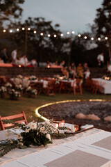Wedding Ceremony with flowers outside in the garden