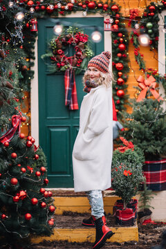 Woman  In Red Funny  Sing Song Dancing In Decorated Illuminated Twinkle Lights Glowing Xmas Tree Near House And Chrismas Tree Stay Back