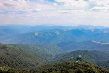 Carpathians mountain range at summer morning. Beauty of wild virgin Ukrainian nature. Peacefulness.