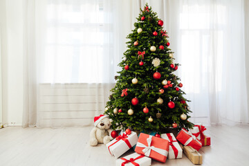 Christmas tree pine with gift decoration decor balls garlands new year interior