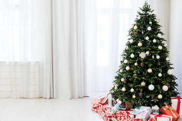 Christmas tree pine with gift decoration decor balls garlands new year interior