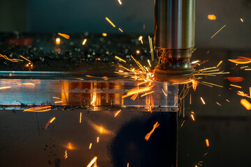 The burning chip from CNC milling machine rough cutting  by index-able  end-mill tools. The bad cutting condition from machining center make tool wear and  heating chip .