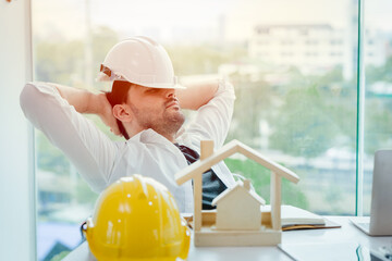 engineer tired and napping or sleeping in the office when lunch brake time after hard work overnight