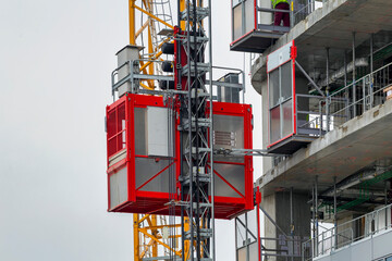 Elevator lifts for workers and material