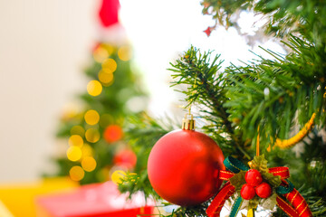 Close up Red ball decorated Christmas tree on blurred, sparkling and  background is bokeh,Merry Christmas and happy holidays