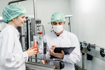 Food and drink factory ISO audit quality control team working, hygiene check and process standard...