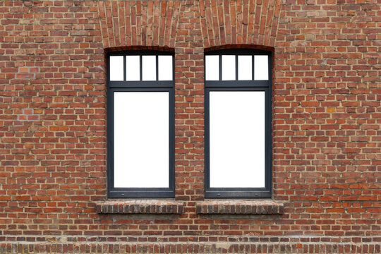 Beautiful old rough brick wall and windows with black frame and isolated white empty space.