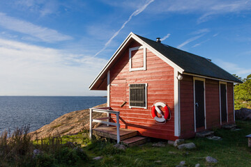 Red cottage at the coast near Oxelosund in south Sweden