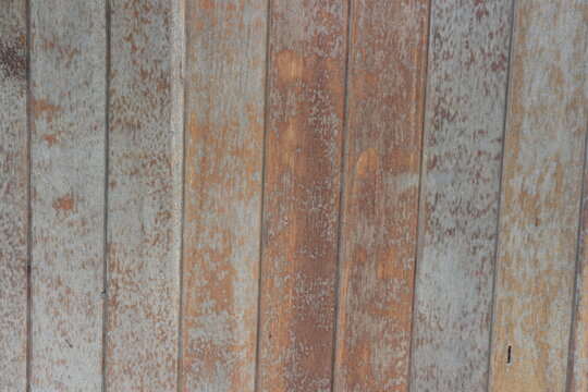 Gray brown old wooden wall © pharuehas