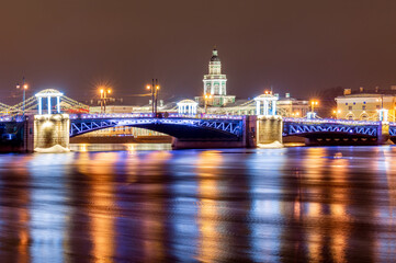 Fototapeta na wymiar Palace Bridge and Kunstkamera museum during New Year and Christmas holidays, Saint Petersburg, Russia