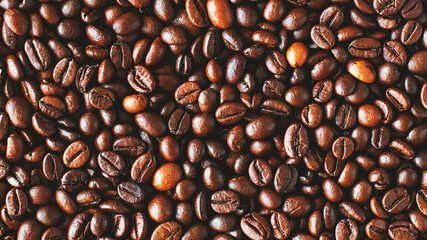 A lot of high-quality roasted aromatic coffee beans that will later be used to make an invigorating...
