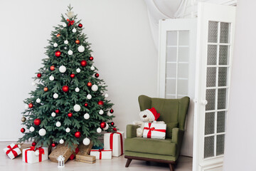 Christmas tree with gift decoration balls garlands new year interior