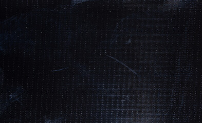 black rubber adhesive tape surface, macro flash photo, dark plastic texture, cool photo overlay.