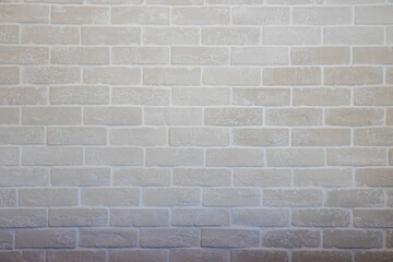 White and gray brick wall texture. Abstract weathered texture stained old stucco light gray and aged paint white brick wall background in rural room