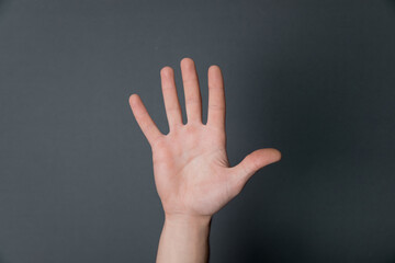 man hand on black background